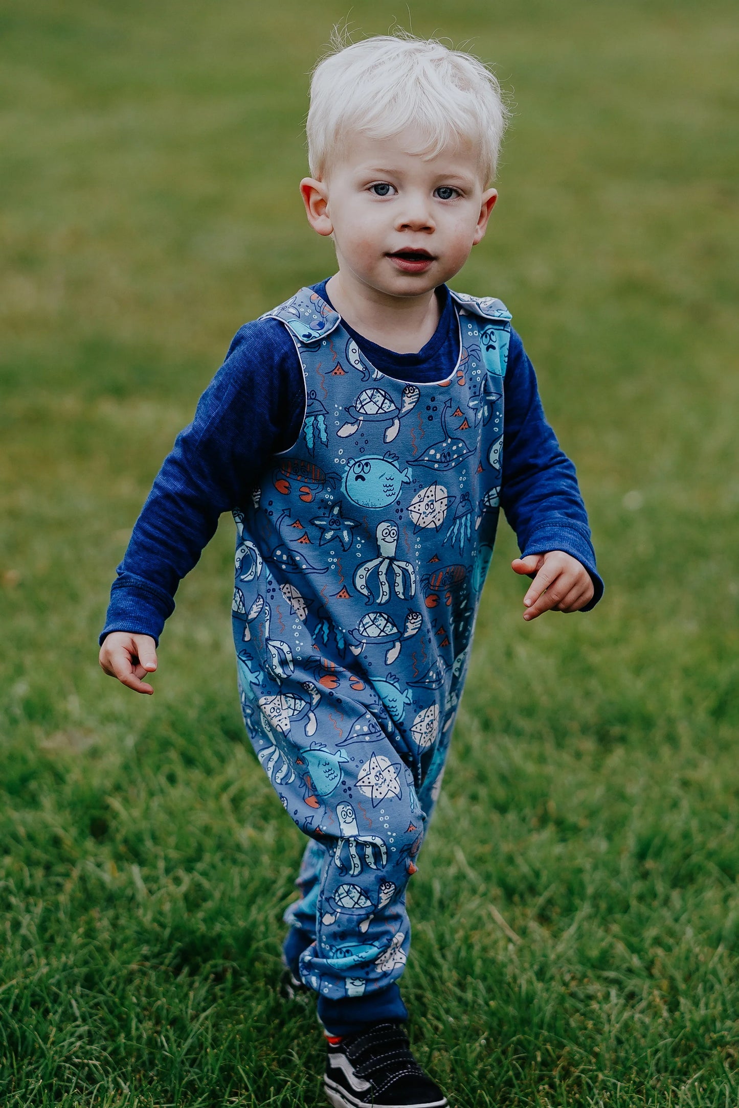 A boy in a romper