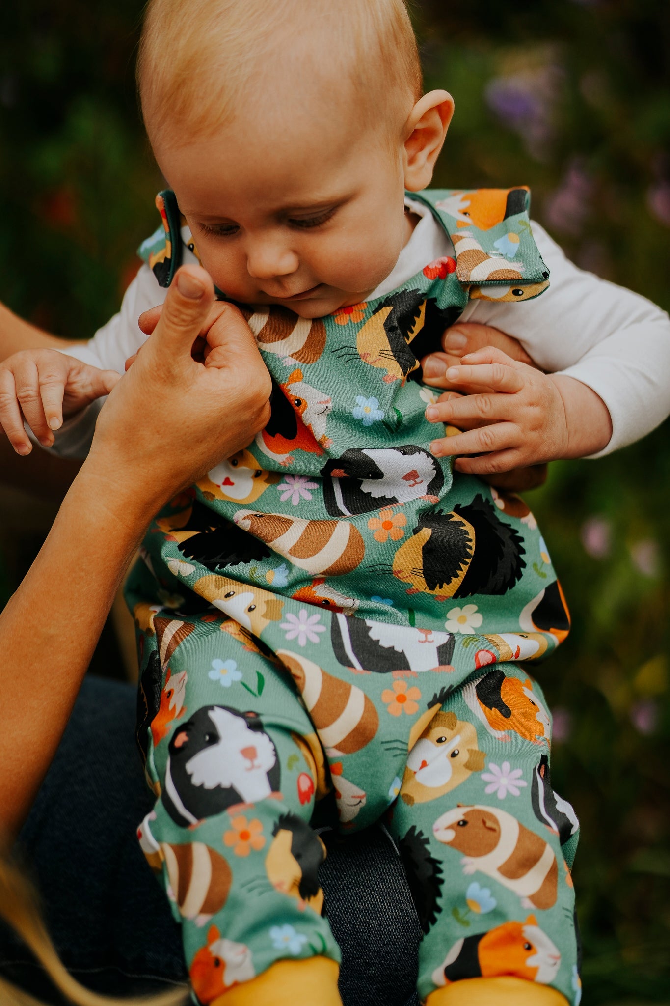A boy in a romper